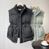 Moteriška liemenė elastingu juosmeniu ir didelėmis kišenėmis