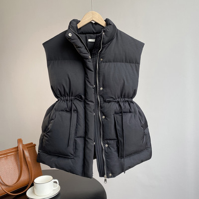 Moteriška liemenė elastingu juosmeniu ir didelėmis kišenėmis