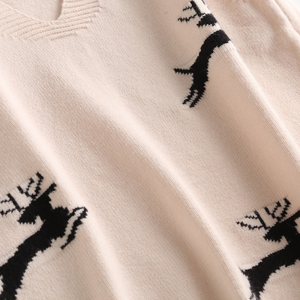 Naiste vest spits-kaelusega aplikatsioonidega