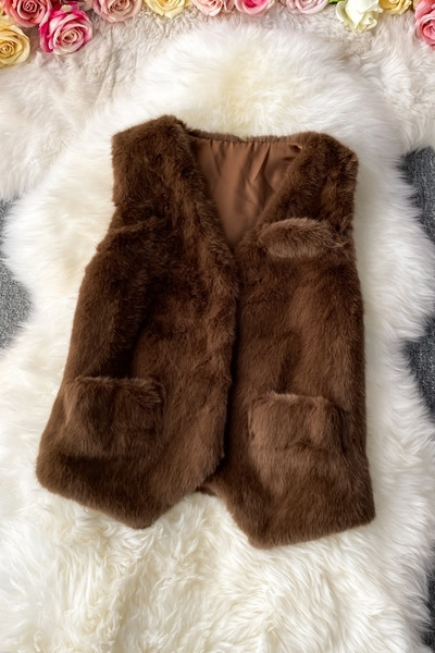 Ležeran ženski prsluk sa špicastim izrezom