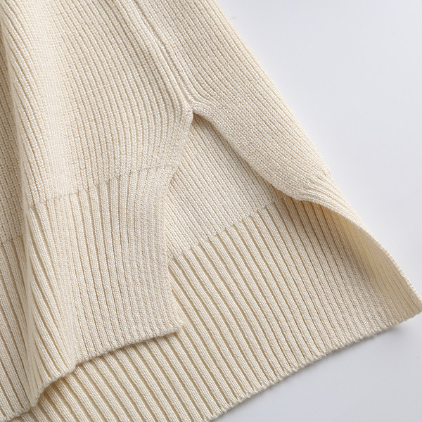 Pikk spitsikaelusega vest naistele