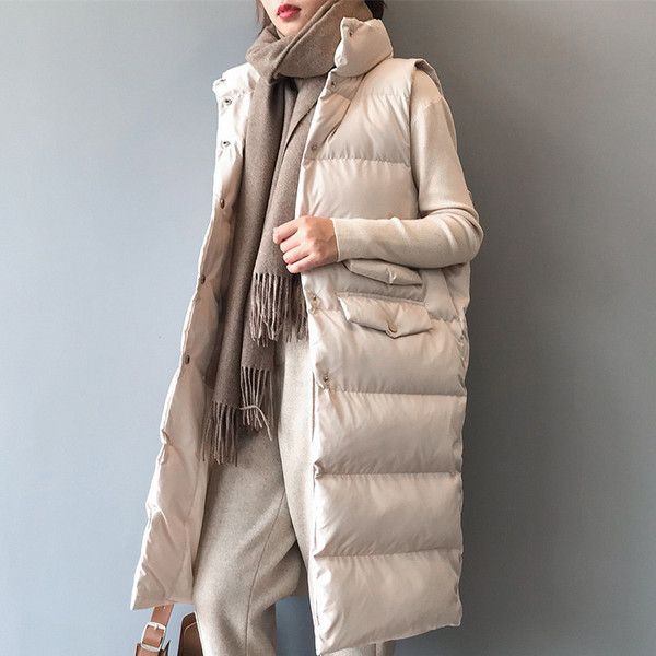 Moderni moteriška ilga liemenė su kišenėmis