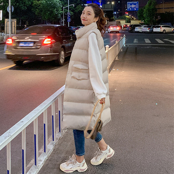 Moderni moteriška ilga liemenė su kišenėmis