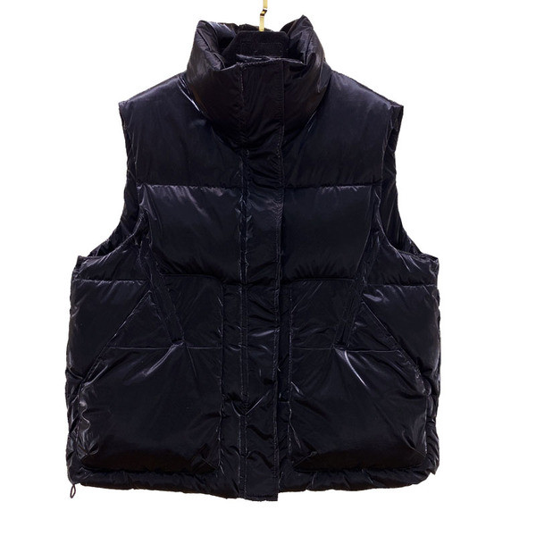 Ženski zimski prsluk s patentnim zatvaračem i džepovima