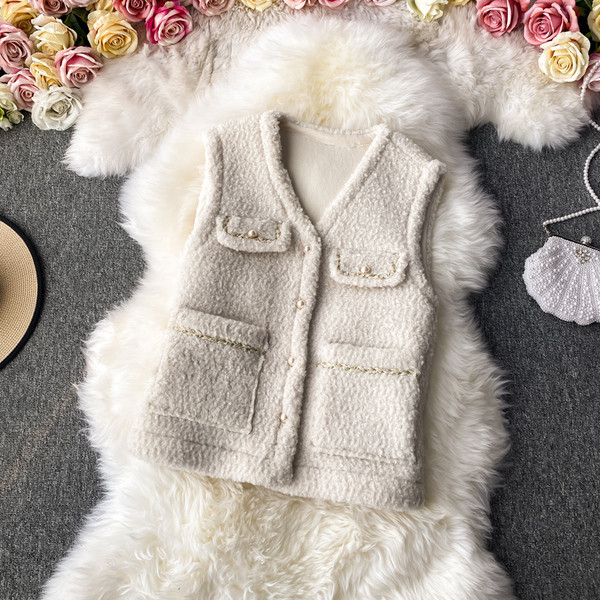 Pehme naiste vabaajavest nööpide ja taskutega