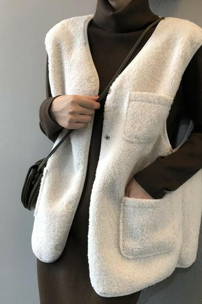 Naiste sügisene sulevest taskutega