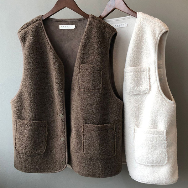 Naiste sügisene sulevest taskutega