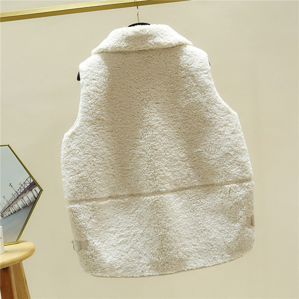 Uus mudel naiste kohev krae ja taskutega vest