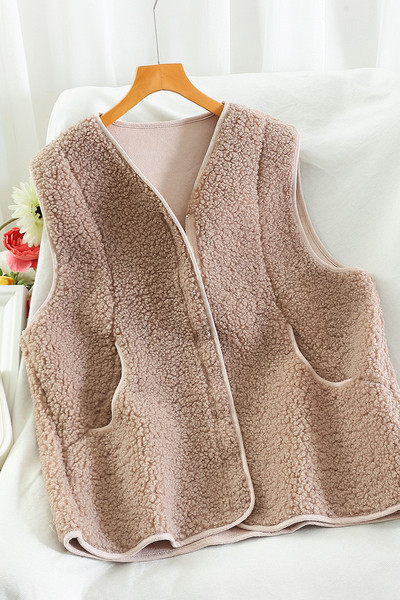 Paprastas moteriškos liemenės modelis su užtrauktuku ir kišenėmis