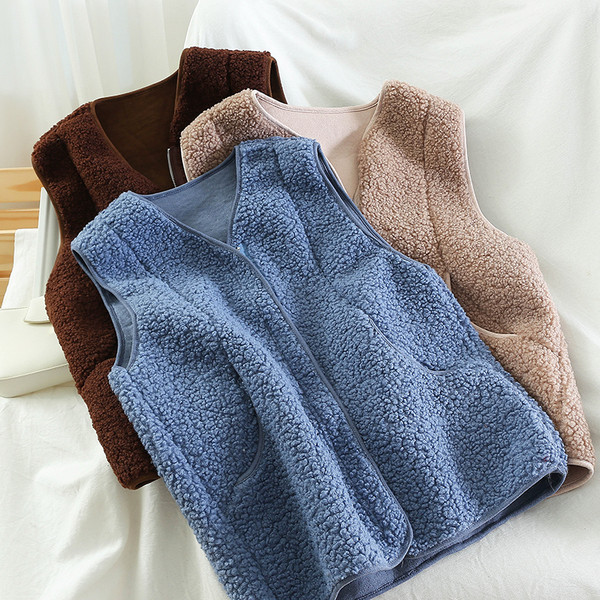 Paprastas moteriškos liemenės modelis su užtrauktuku ir kišenėmis