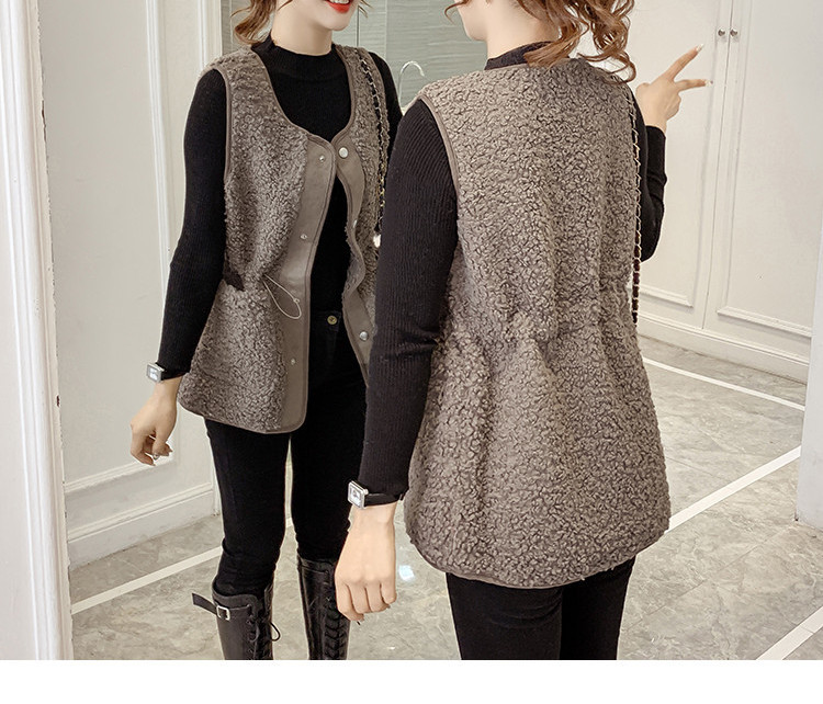 Ženski prsluk s elastičnim strukom i gumbima