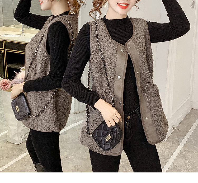 Ženski prsluk s elastičnim strukom i gumbima