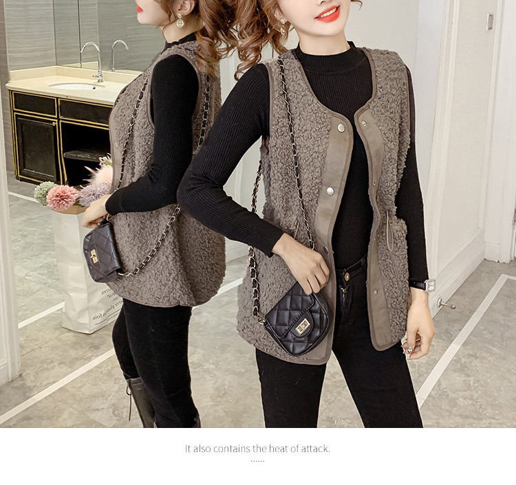 Ženski prsluk s elastičnim strukom i gumbima