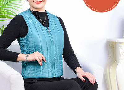 Uue mudeli tikandiga ja spitsikaelusega naiste vest
