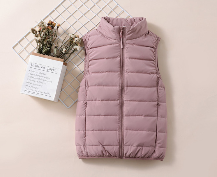 Naiste sportfliisist kõrge kraega vest