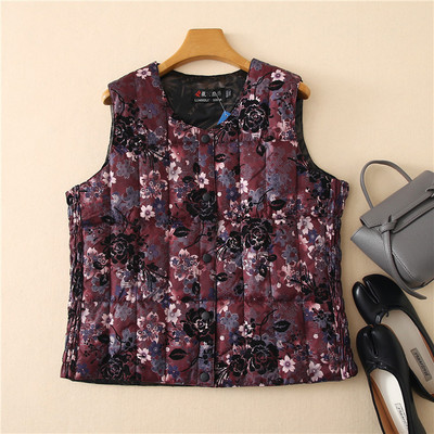 Ümara kaelusega ja lillemotiividega naiste vest