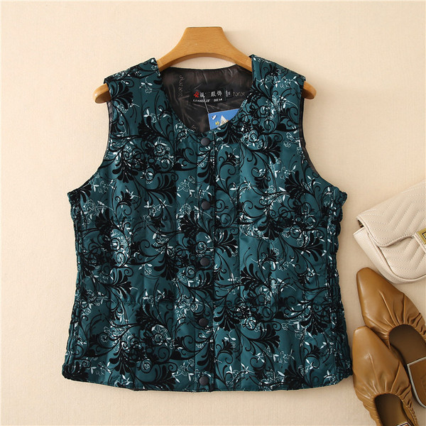 Ümara kaelusega ja lillemotiividega naiste vest