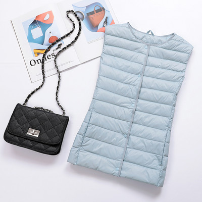 Naiste vabaaja vest ovaalse dekoltee ja nööpidega