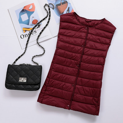 Naiste vabaaja vest ovaalse dekoltee ja nööpidega