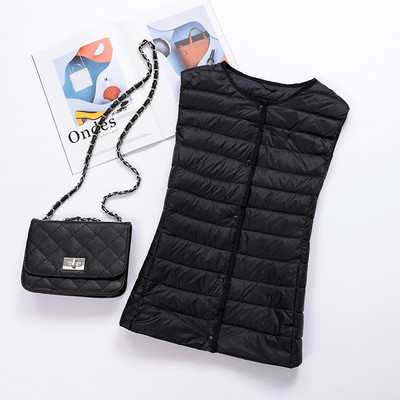 Naiste vabaaja vest ovaalse dekoltee ja nööpidega