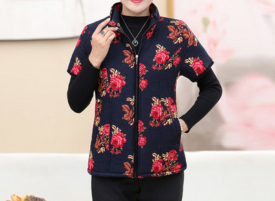 Uue mudeli lillemustriga ja lühikeste varrukatega naiste vest