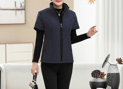 Uue mudeli lillemustriga ja lühikeste varrukatega naiste vest