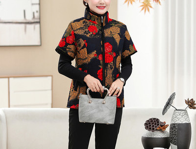 Uue mudeli lillemustriga ja lühikeste varrukatega naiste vest