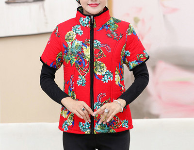 Uue mudeli lillemustriga ja lühikeste varrukatega naiste vest