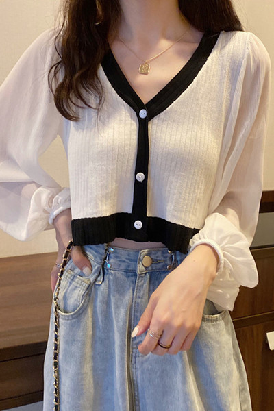 Modernus moteriškas trumpas megztinis plačiomis rankovėmis