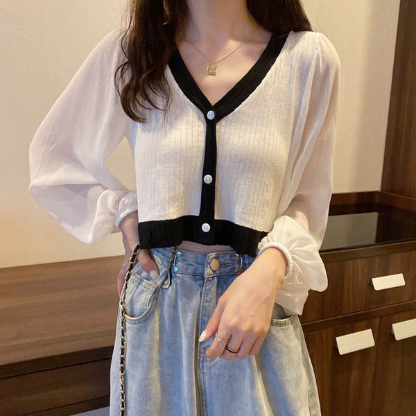 Modernus moteriškas trumpas megztinis plačiomis rankovėmis