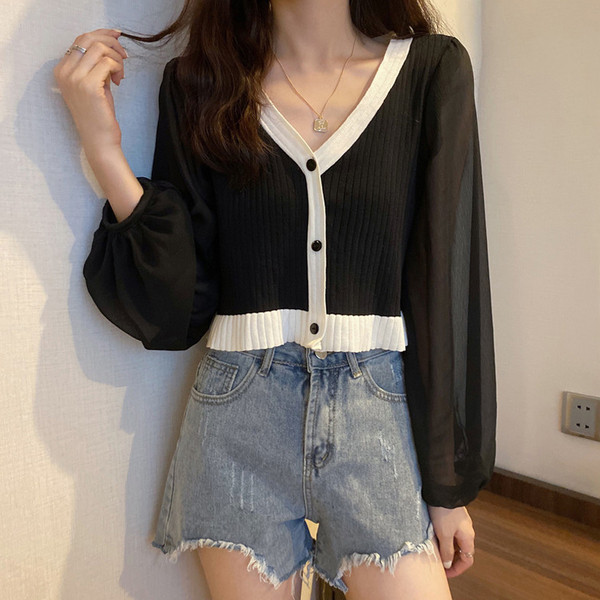 Modernus moteriškas trumpas megztinis plačiomis rankovėmis