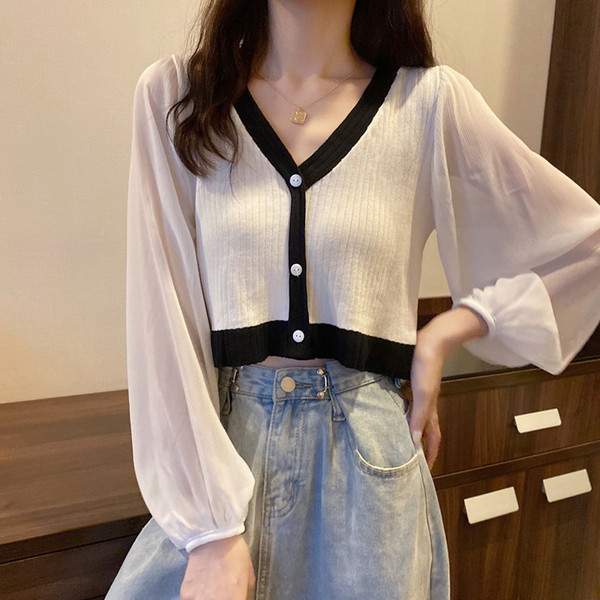 Modernus moteriškas trumpas megztinis plačiomis rankovėmis