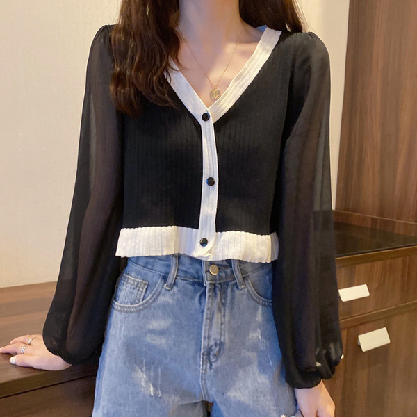 Modernus moteriškas trumpas megztinis plačiomis rankovėmis