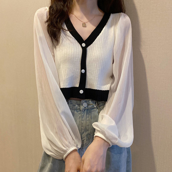 Modernus moteriškas trumpas megztinis plačiomis rankovėmis