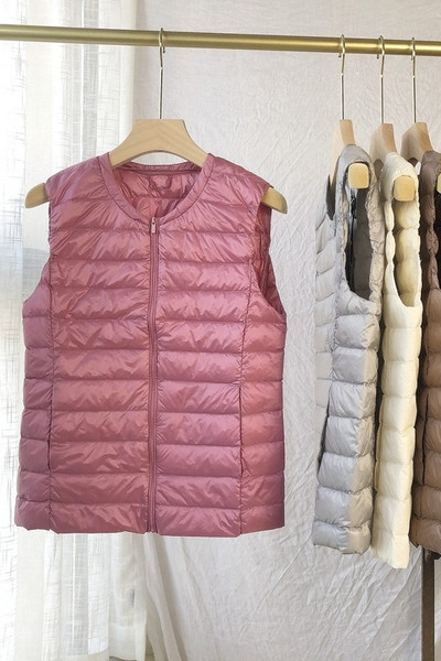 Naiste vabaaja vest ümara kaelusega ja lukuga