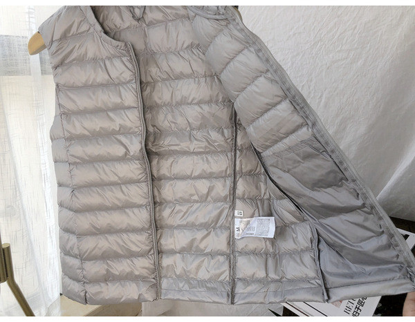 Naiste vabaaja vest ümara kaelusega ja lukuga