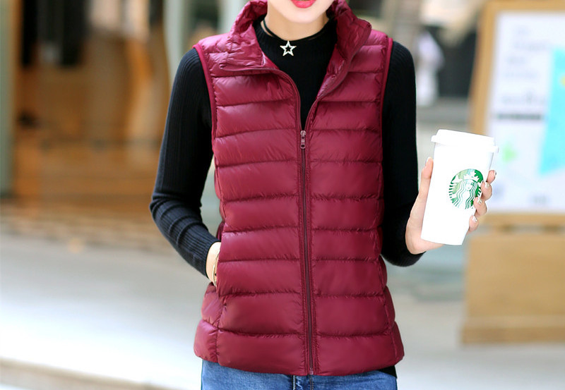 Lagani ženski prsluk s patentnim zatvaračem kratki model