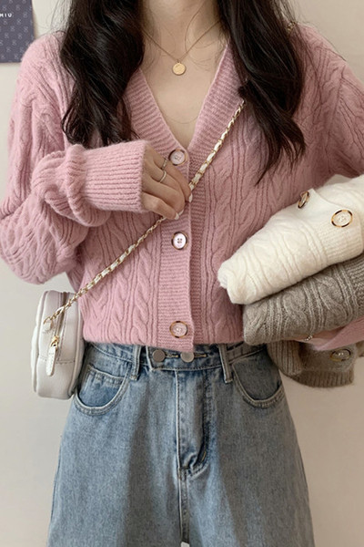 Moodne naiste vest V-kaelusega ja nööpidega