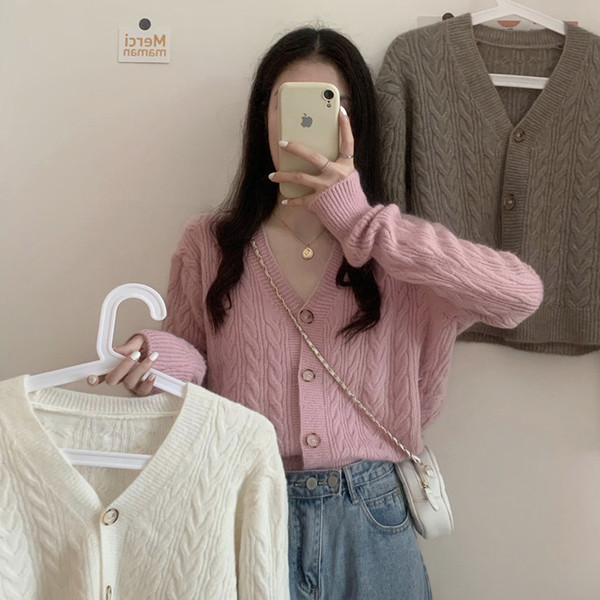 Moodne naiste vest V-kaelusega ja nööpidega