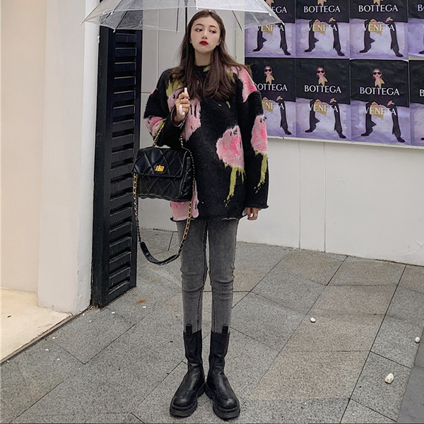 Modernus moteriškas platus megztinis su raštu