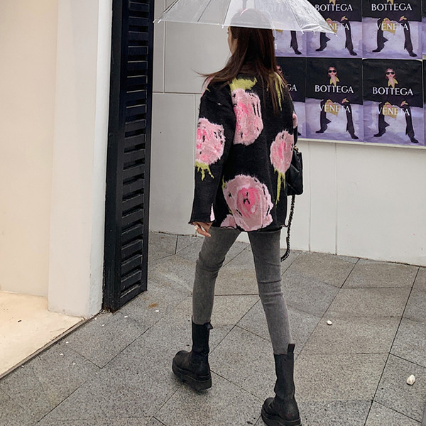 Modernus moteriškas platus megztinis su raštu