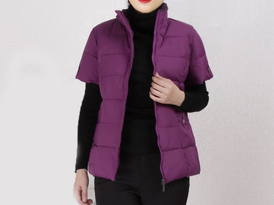 Uue mudeli kõrge krae ja tikandiga naistevest