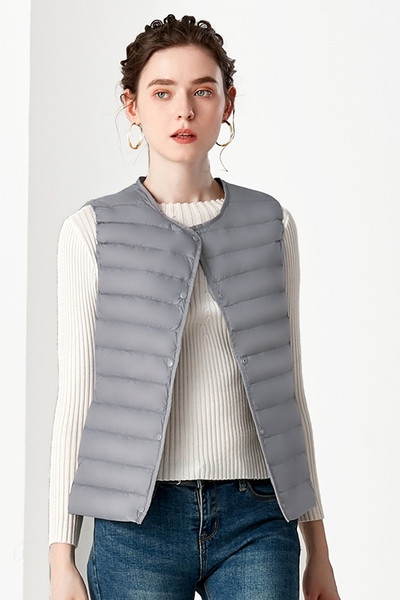 Laste vabaaja vest ovaalse dekoltee ja nööpidega