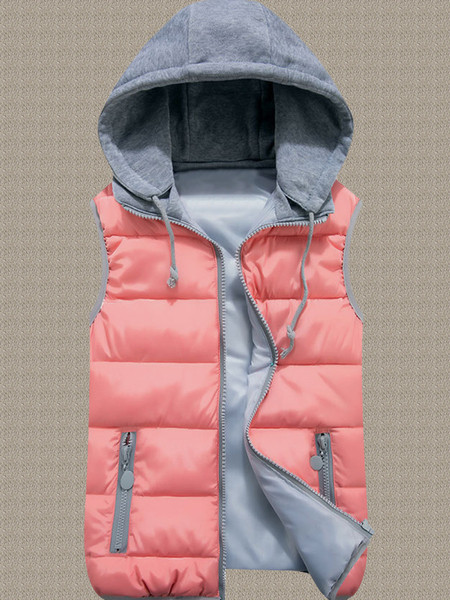 Uue mudeli kapuutsiga ja taskutega naiste talvevest