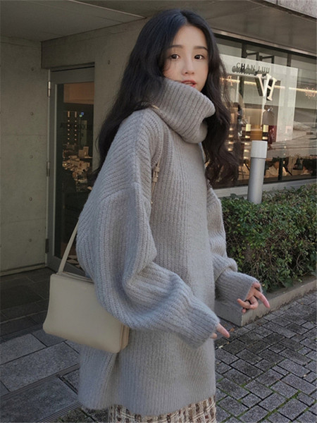 Κομψό γυναικείο μακρύ πουλόβερ φαρδύ μοντέλο με ψηλό γιακά