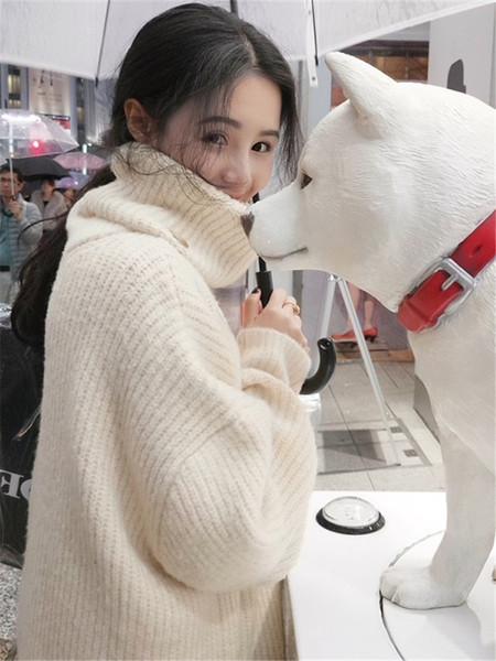 Κομψό γυναικείο μακρύ πουλόβερ φαρδύ μοντέλο με ψηλό γιακά