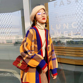 Modernus moteriškas ilgas platus megztinis su raštu