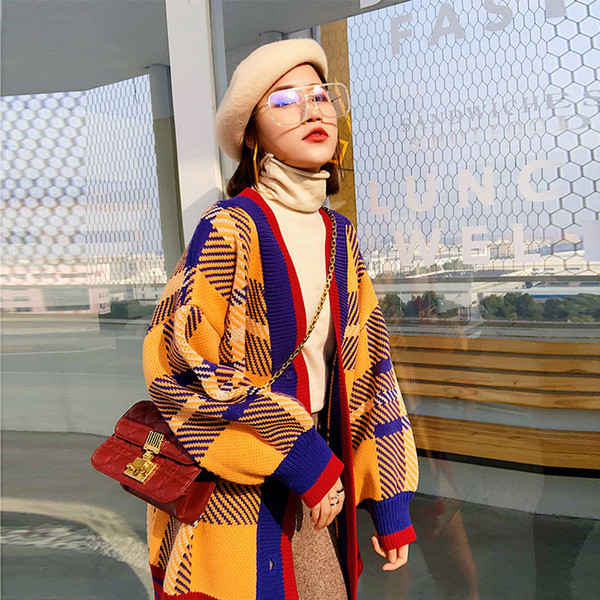 Modernus moteriškas ilgas platus megztinis su raštu