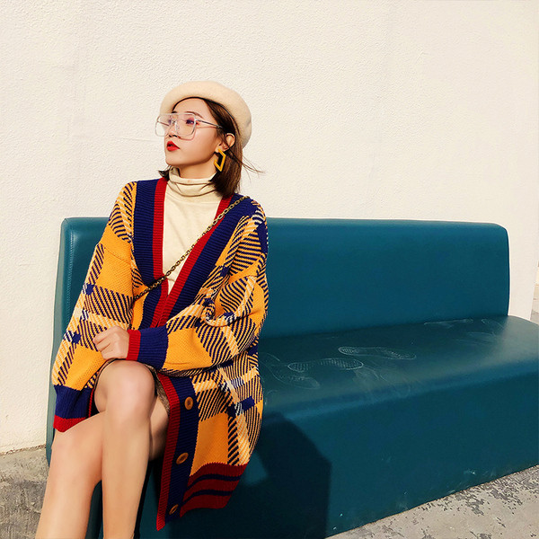 Modernus moteriškas ilgas platus megztinis su raštu