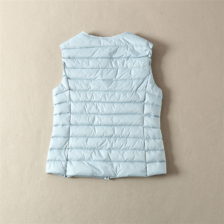 Vabaaja naiste vest ovaalse dekoltee ja taskutega